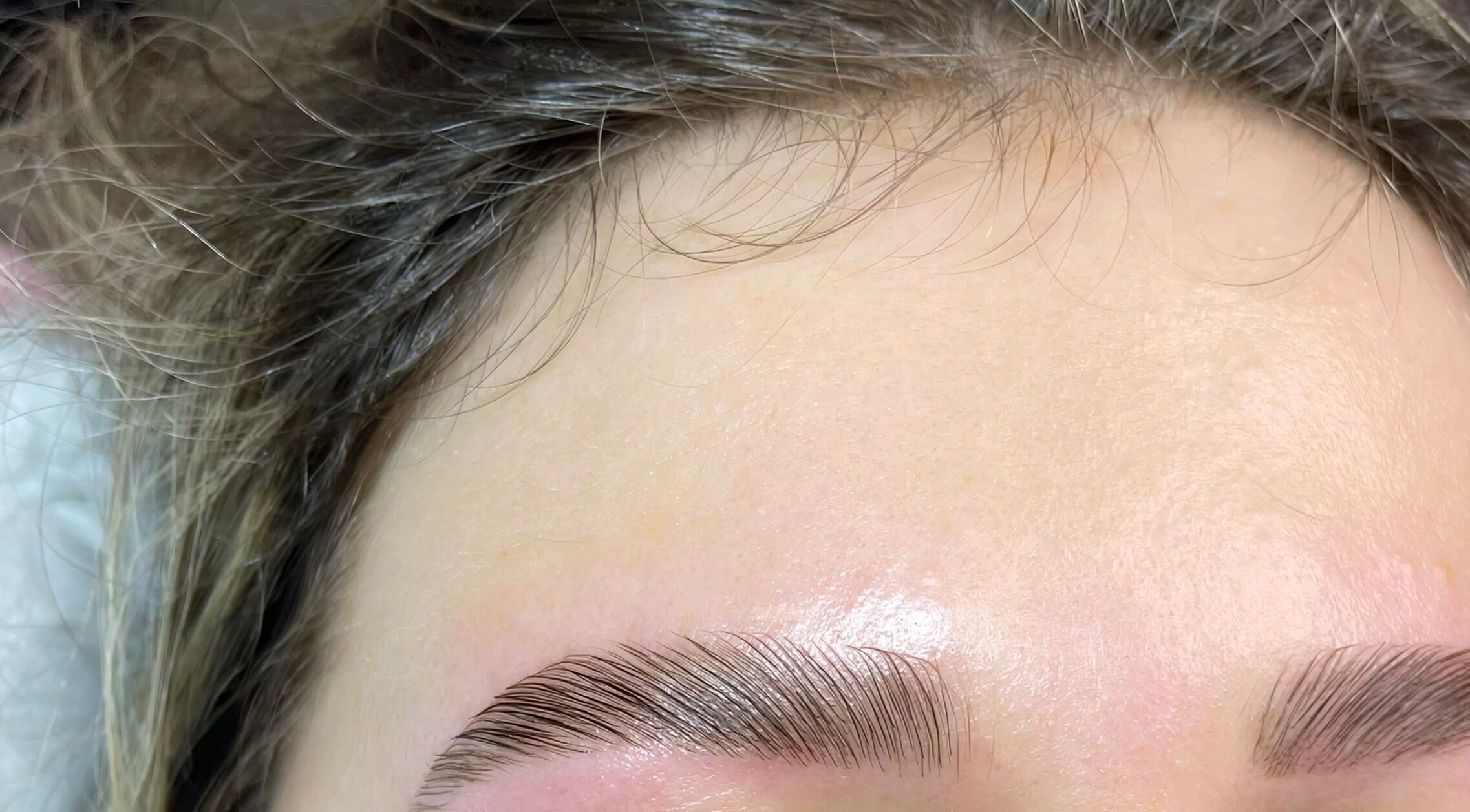 Close-up of expertly styled eyebrows at By Liv, Doncaster, England, GB. Achieve elegant brow perfection.