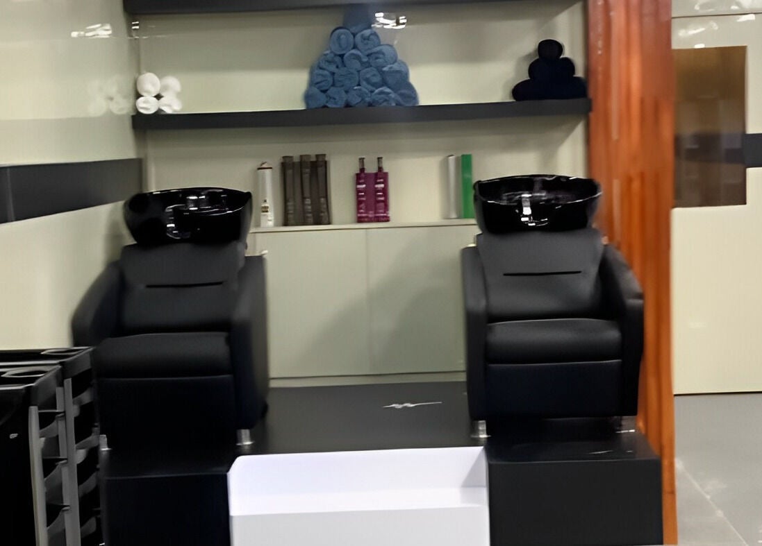 Modern wash stations at Bevel Unisex Salon in Kathmandu, Nepal, Bagmati Province, NP.