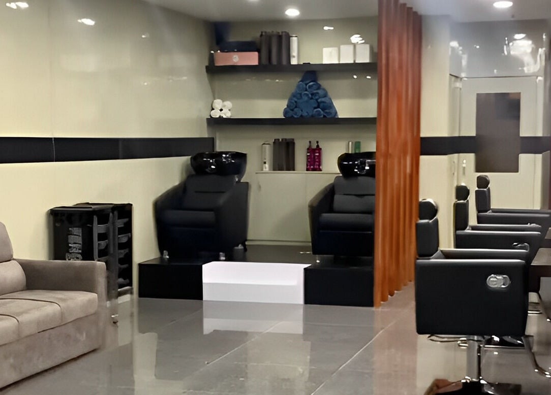 Modern salon interior at Bevel Unisex Salon, Kathmandu, Nepal, Bagmati Province, NP, featuring stylish seating.