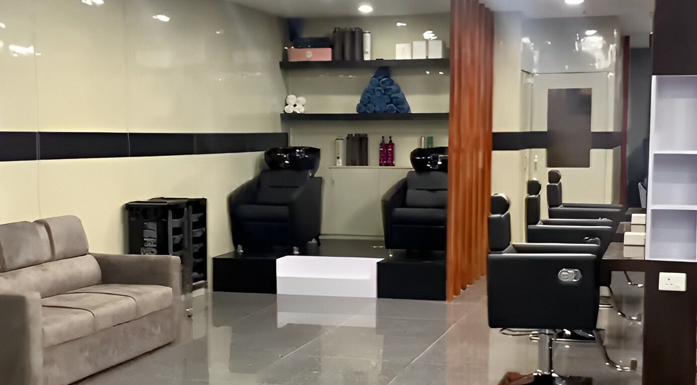 Modern salon interior at Bevel Unisex Salon, Kathmandu, Nepal, Bagmati Province, NP, featuring stylish seating.