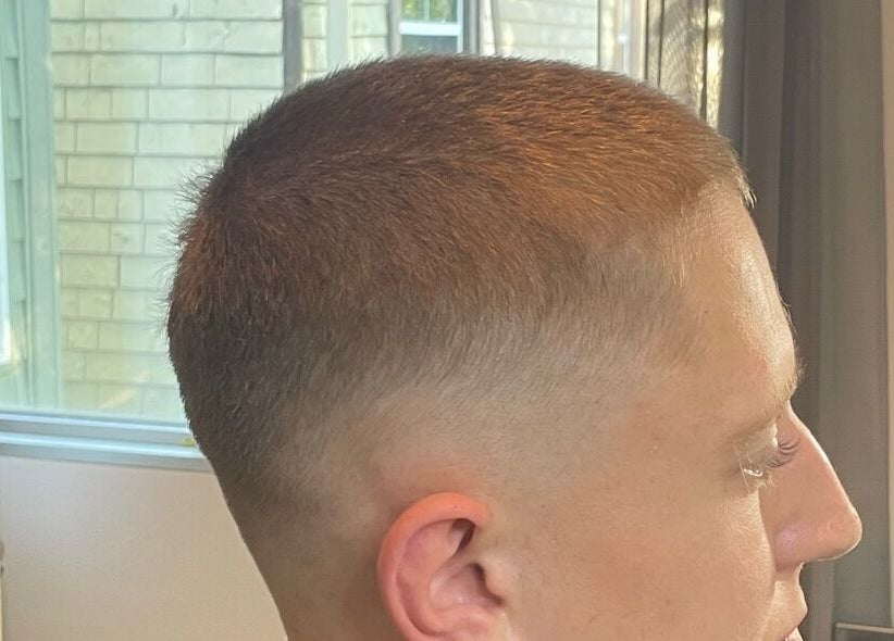Stylish fade haircut at D.A Cutz, Halifax, Nova Scotia, CA, showcasing precise barbering skills.