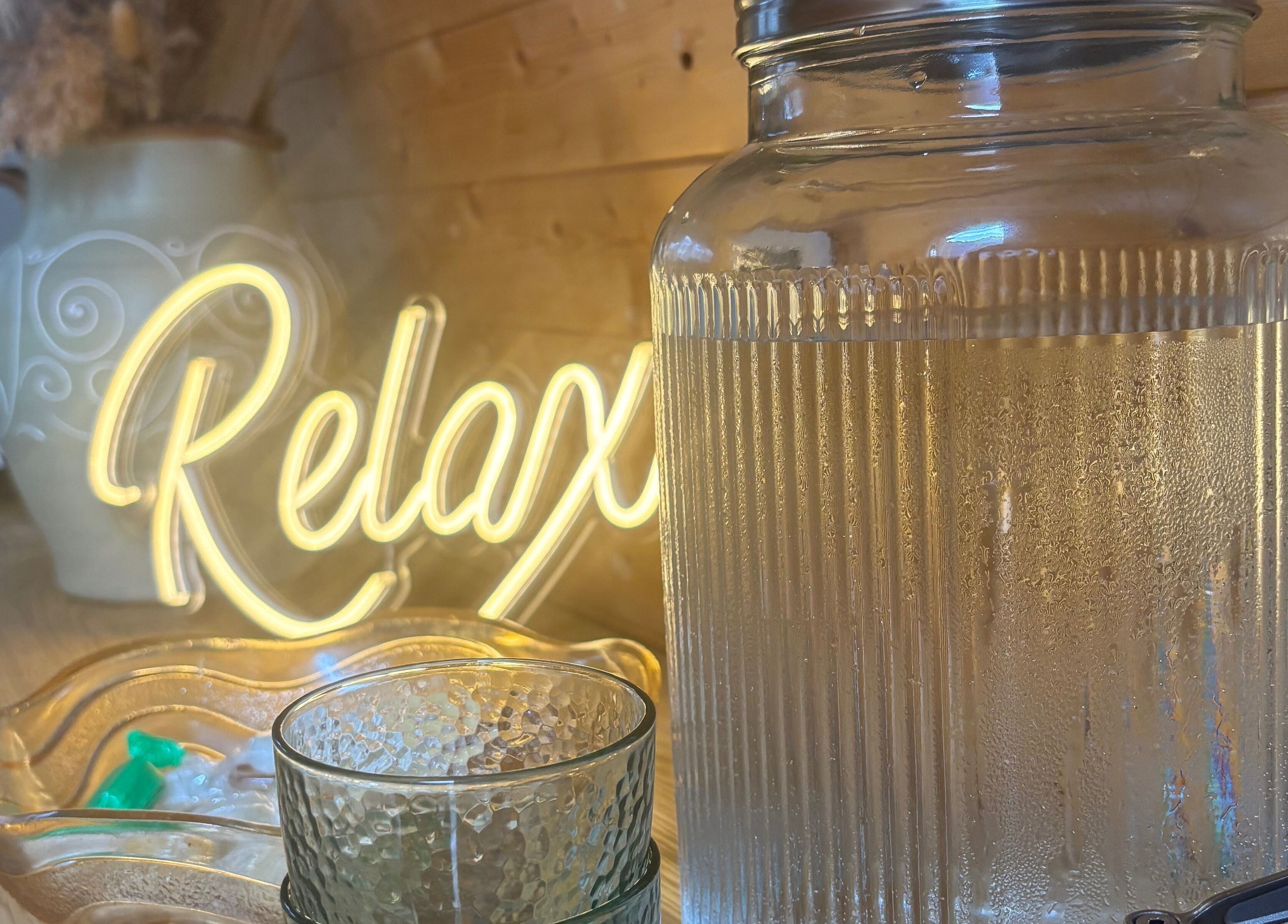 Relaxation area with water jar and decor at Rhilax, Ilkeston, England, GB