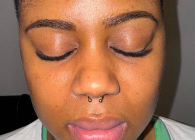 Close-up of serene face showcasing beauty treatment at Aestheticsby.Yas, Sandton, Gauteng, ZA.