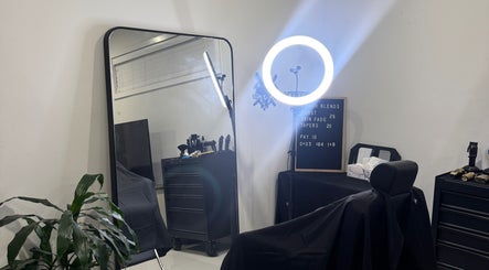 Stylish salon setup at Fergo Blends, Leppington, New South Wales, AU, featuring a mirror and ring light.