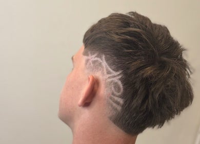 Stylish undercut design at Fergo Blends, Leppington, New South Wales, AU showcasing unique artistic patterns.