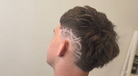 Stylish undercut design at Fergo Blends, Leppington, New South Wales, AU showcasing unique artistic patterns.