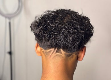 Intricate haircut design at Fergo Blends, Leppington, New South Wales, AU, showcasing modern hair artistry.