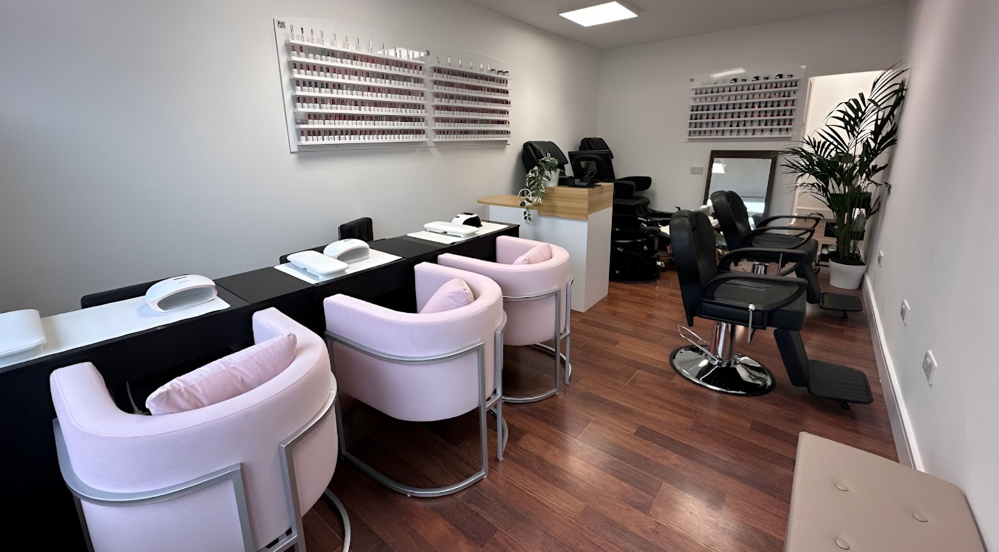 Modern nail and beauty salon at Urban Beauty, Dublin, County Dublin, IE with chic seating and decor.