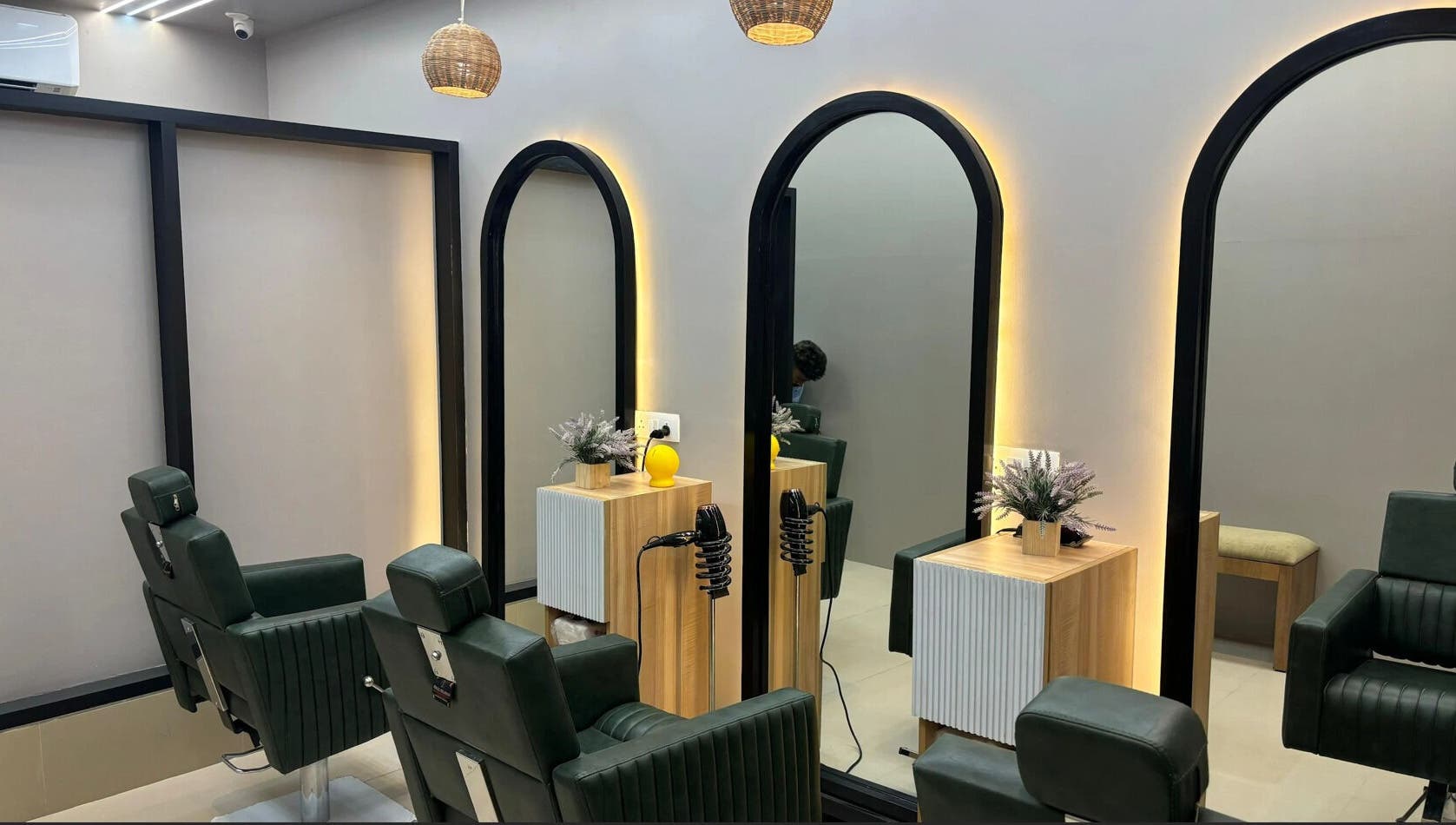 Elegant salon interior at EVERMOR ANCHAL, ANCHAL, Kerala, IN, featuring stylish chairs and modern decor.