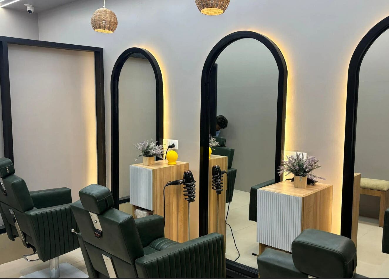 Elegant salon interior at EVERMOR ANCHAL, ANCHAL, Kerala, IN, featuring stylish chairs and modern decor.