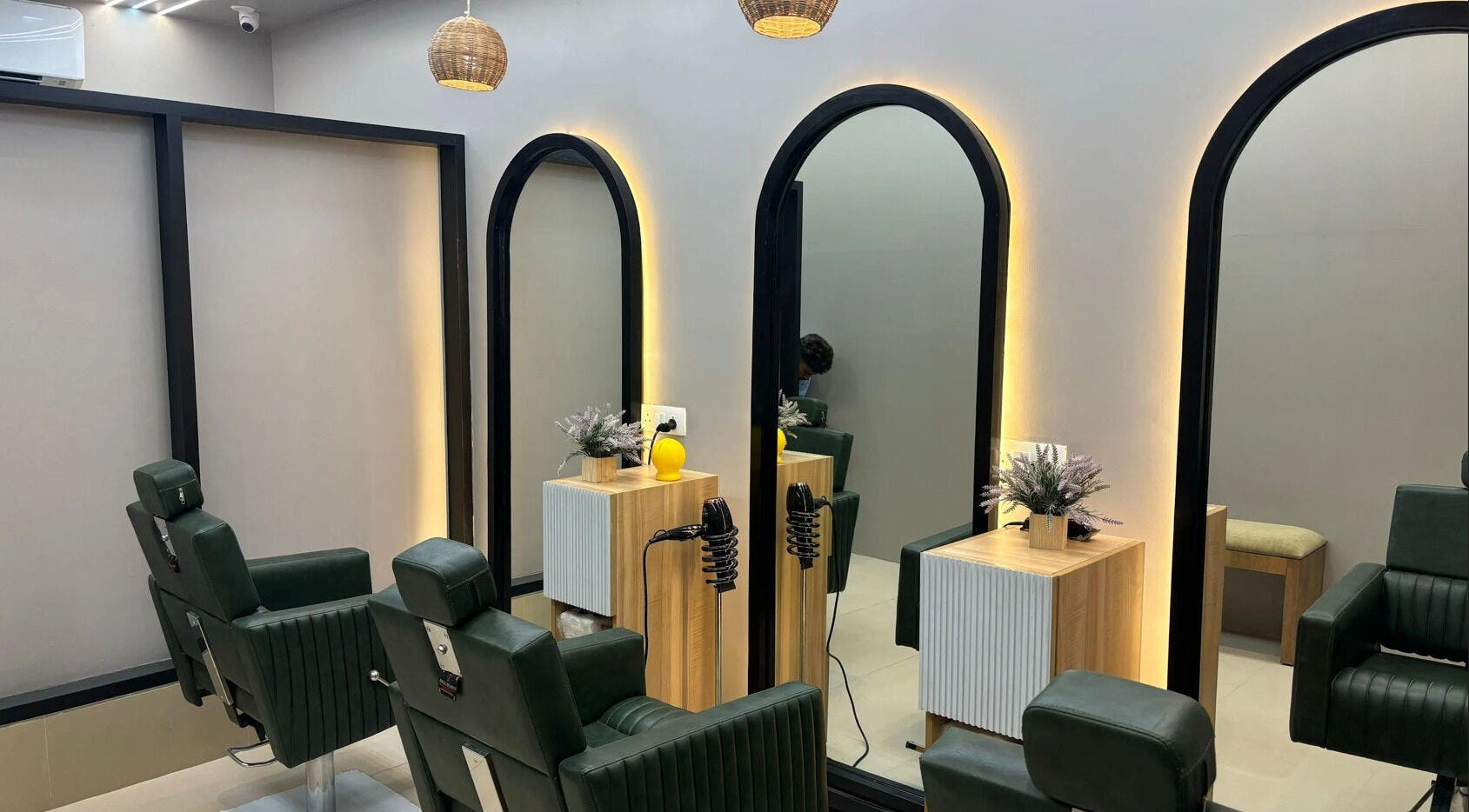 Elegant salon interior at EVERMOR ANCHAL, ANCHAL, Kerala, IN, featuring stylish chairs and modern decor.