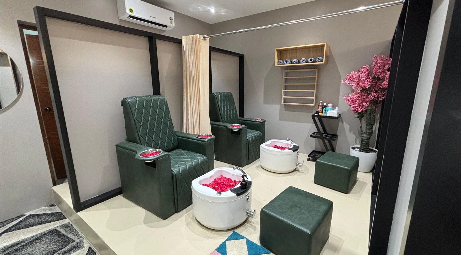 Luxurious pedicure chairs with rose petals at EVERMOR ANCHAL, ANCHAL, Kerala, IN offer a serene spa experience.