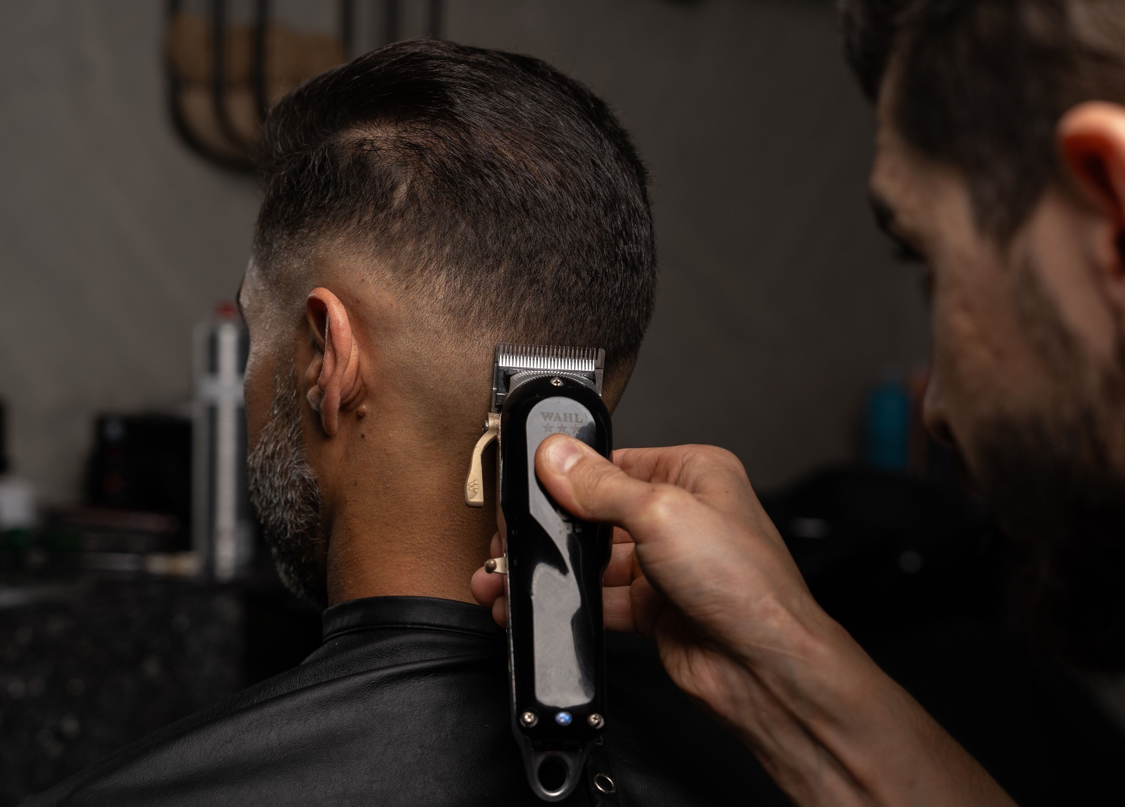 Professional haircut in progress at Spartan Barber WLL, Saar, Al-muḥāfaẓat Aš-šamālīyah, BH.