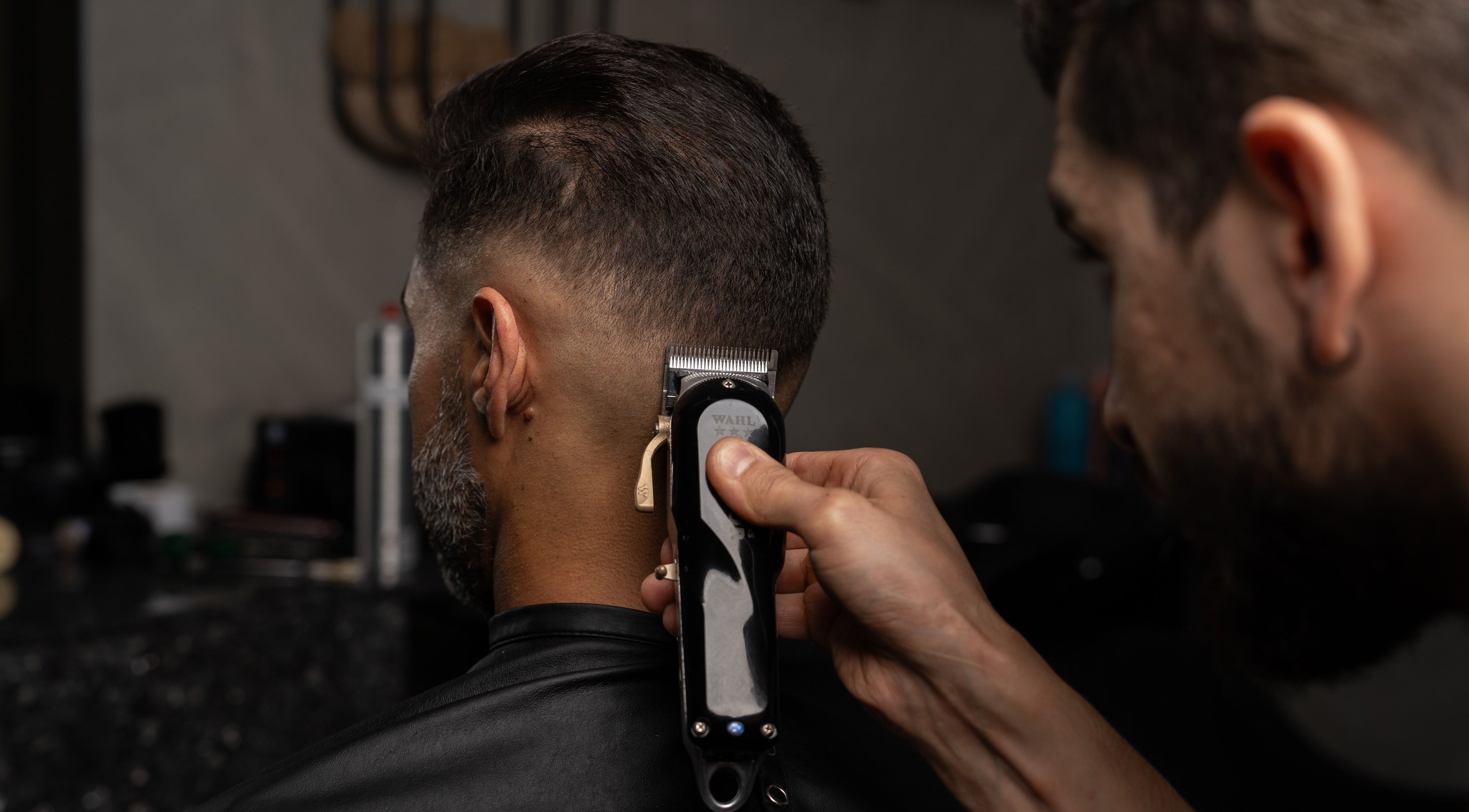 Professional haircut in progress at Spartan Barber WLL, Saar, Al-muḥāfaẓat Aš-šamālīyah, BH.