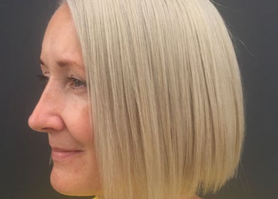 Side view of a sleek blonde bob haircut at POP West Norwood, London, England, GB.