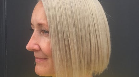 Side view of a sleek blonde bob haircut at POP West Norwood, London, England, GB.