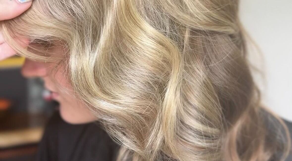 Close-up of styled blond waves at Mane Artistry By Jay, Hertfordshire, GB.