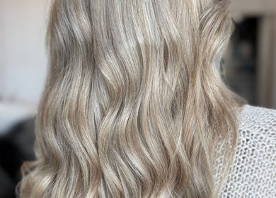 Elegant blonde waves styled at House Of Envy Longford, Gloucester, England, GB.