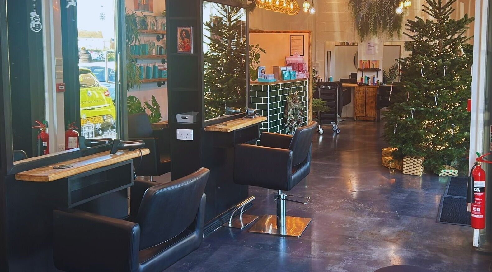 House Of Envy Longford salon with chic decorations in Gloucester, England, GB, featuring elegant styling chairs.