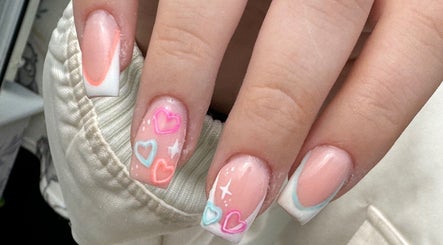 Heart-themed nail art at Wings of Beauty, Leeds, England, GB.