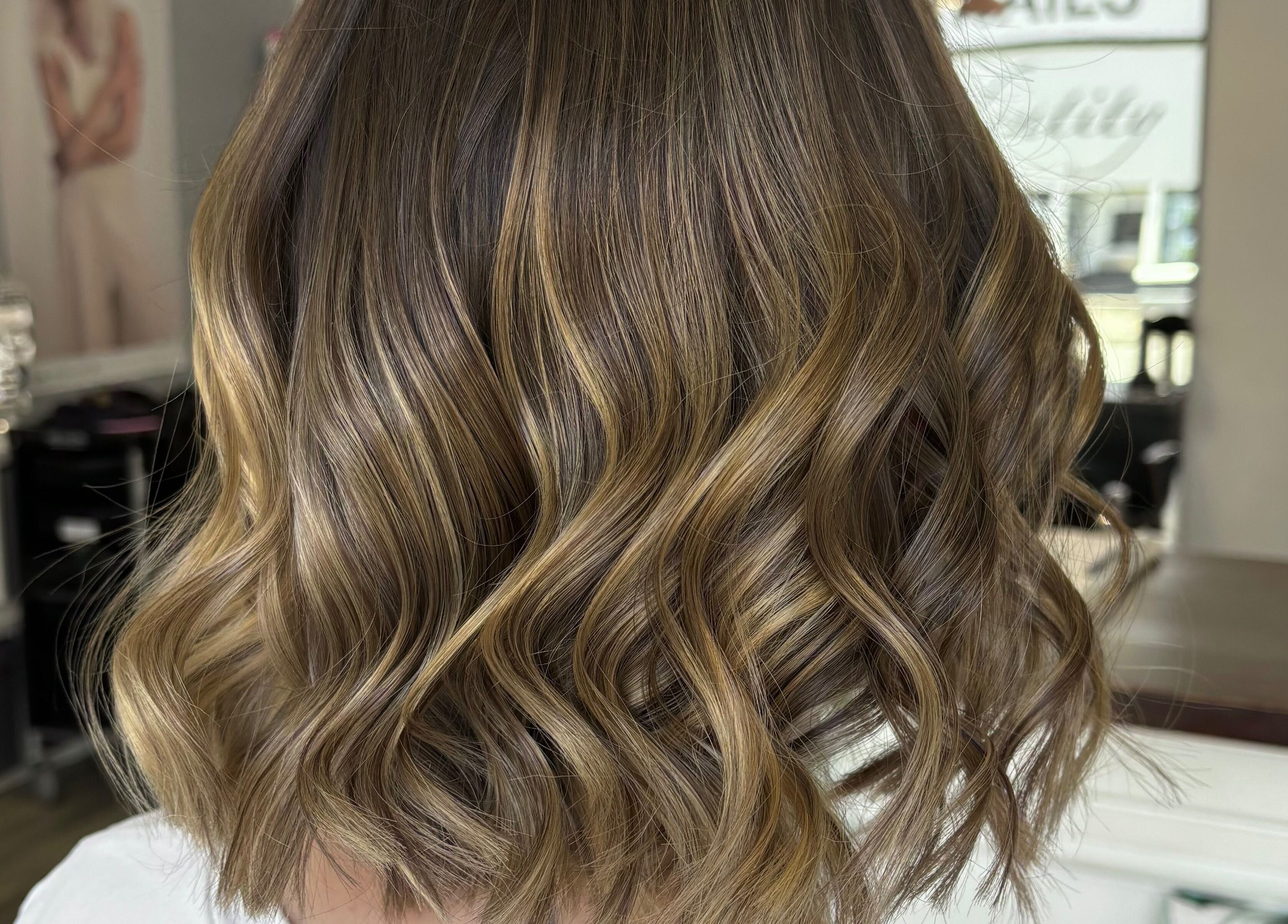 Soft golden waves hairstyle at Hair by Lottie in Weston-super-mare, England, GB.