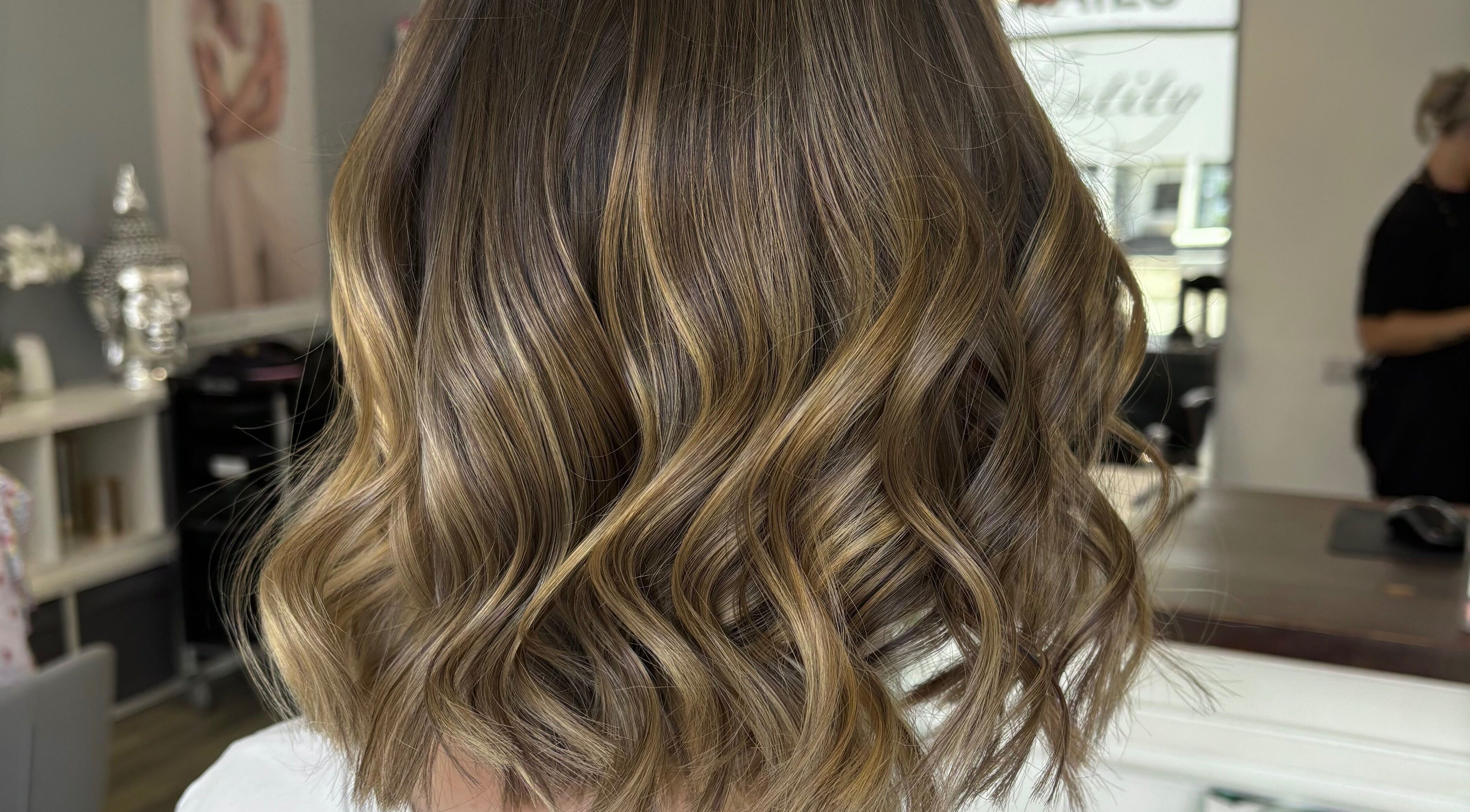 Soft golden waves hairstyle at Hair by Lottie in Weston-super-mare, England, GB.