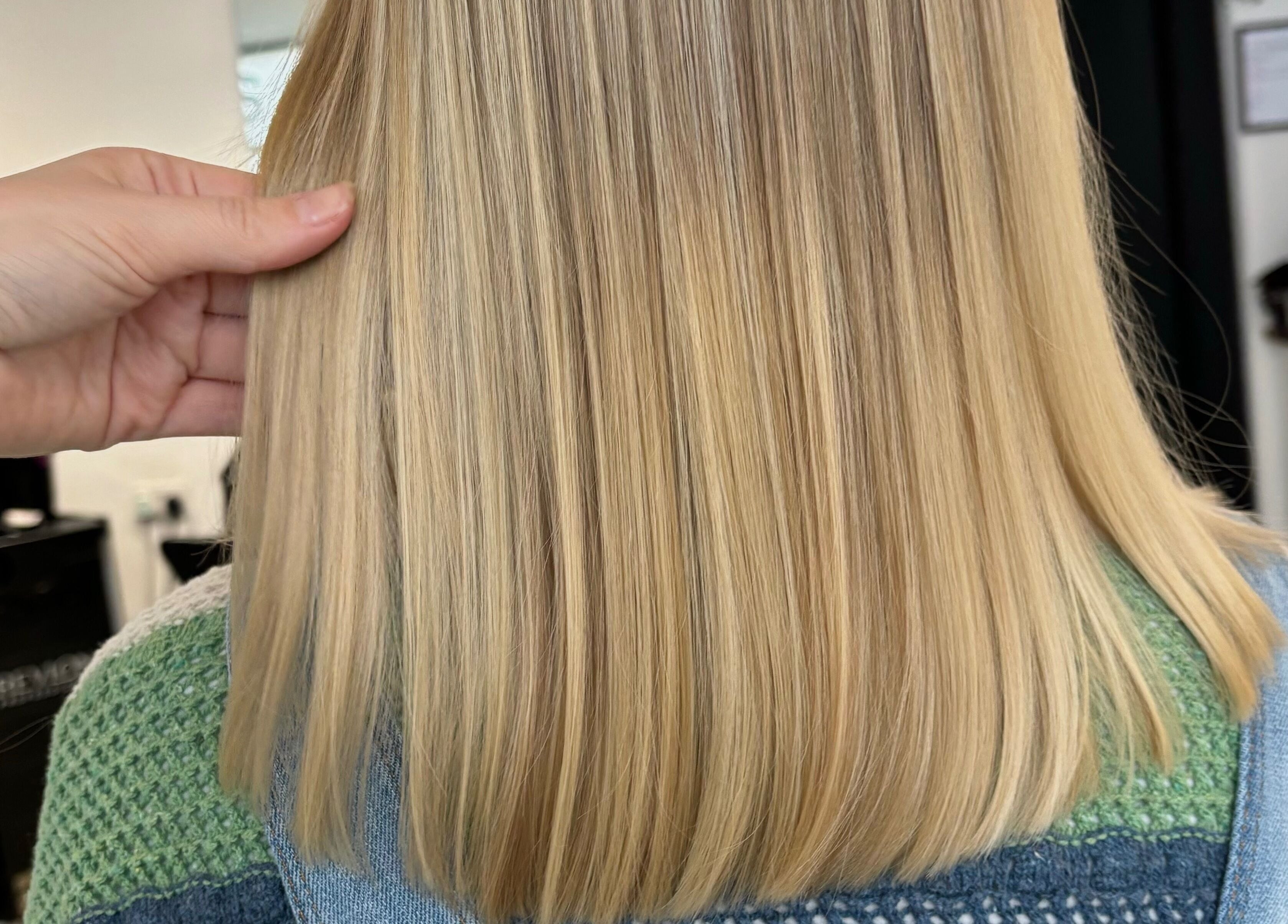 Sleek blonde hair at Hair by Lottie, showcasing mastery in Weston-super-Mare, England, GB.