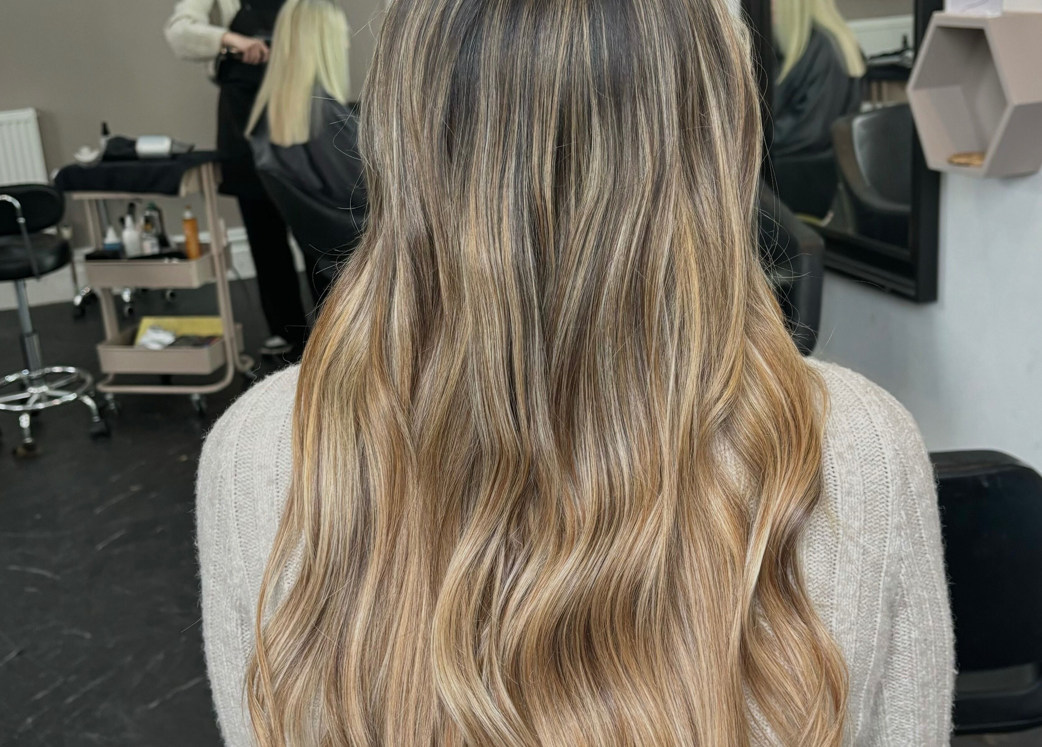 Beautifully styled wavy hair at Hair by Lottie in Weston-super-Mare, England, GB.