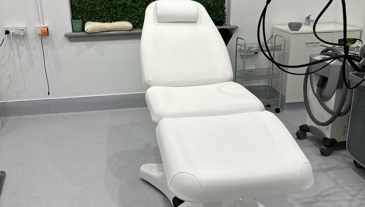 Tranquil treatment room at TMC Lifestyle & Aesthetics, Wagga Wagga, New South Wales, AU, with white spa chair.