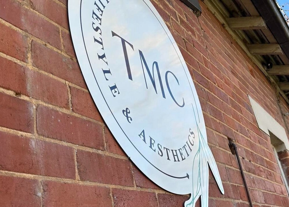 TMC Lifestyle & Aesthetics sign on brick wall, Wagga Wagga, New South Wales, AU, showcasing elegance.