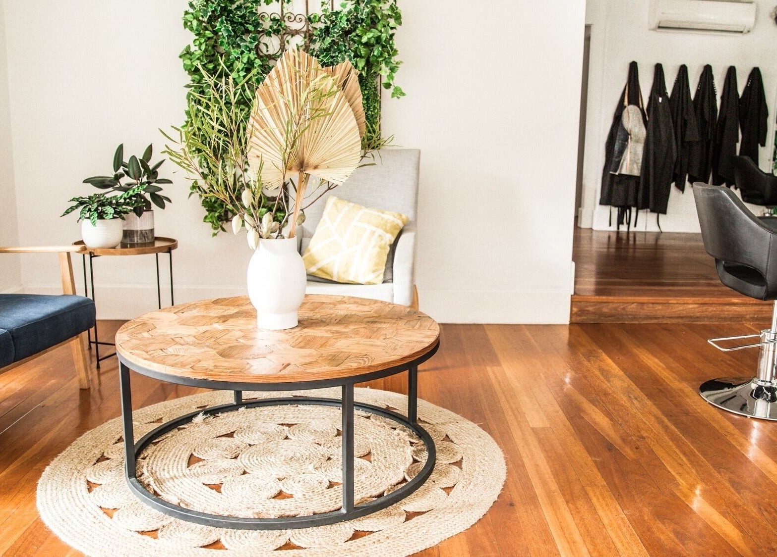 Elegant seating area at Sessions Hairdressing, Mcmahons Point, New South Wales, AU, featuring stylish decor.