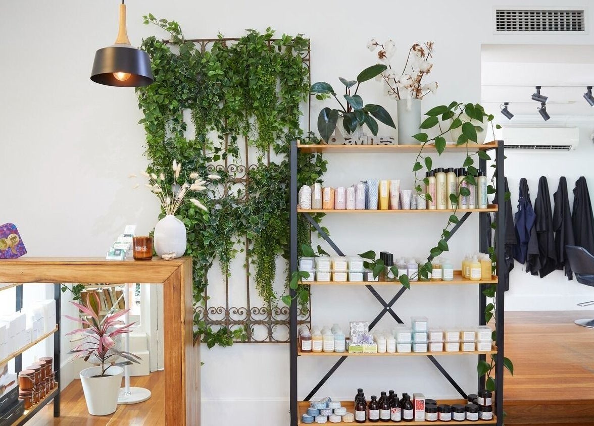 Sessions Hairdressing showcases a lush, inviting interior in Mcmahons Point, New South Wales, AU.