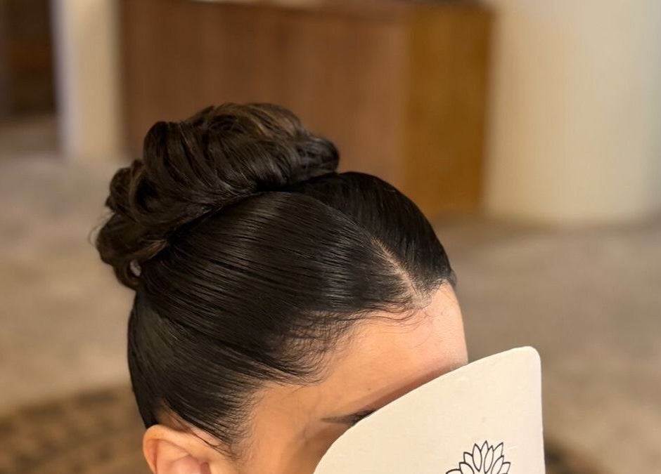 Stylish updo hairstyle at Yoush Spa in Riyadh, Riyadh Province, SA, showcasing sophisticated elegance.