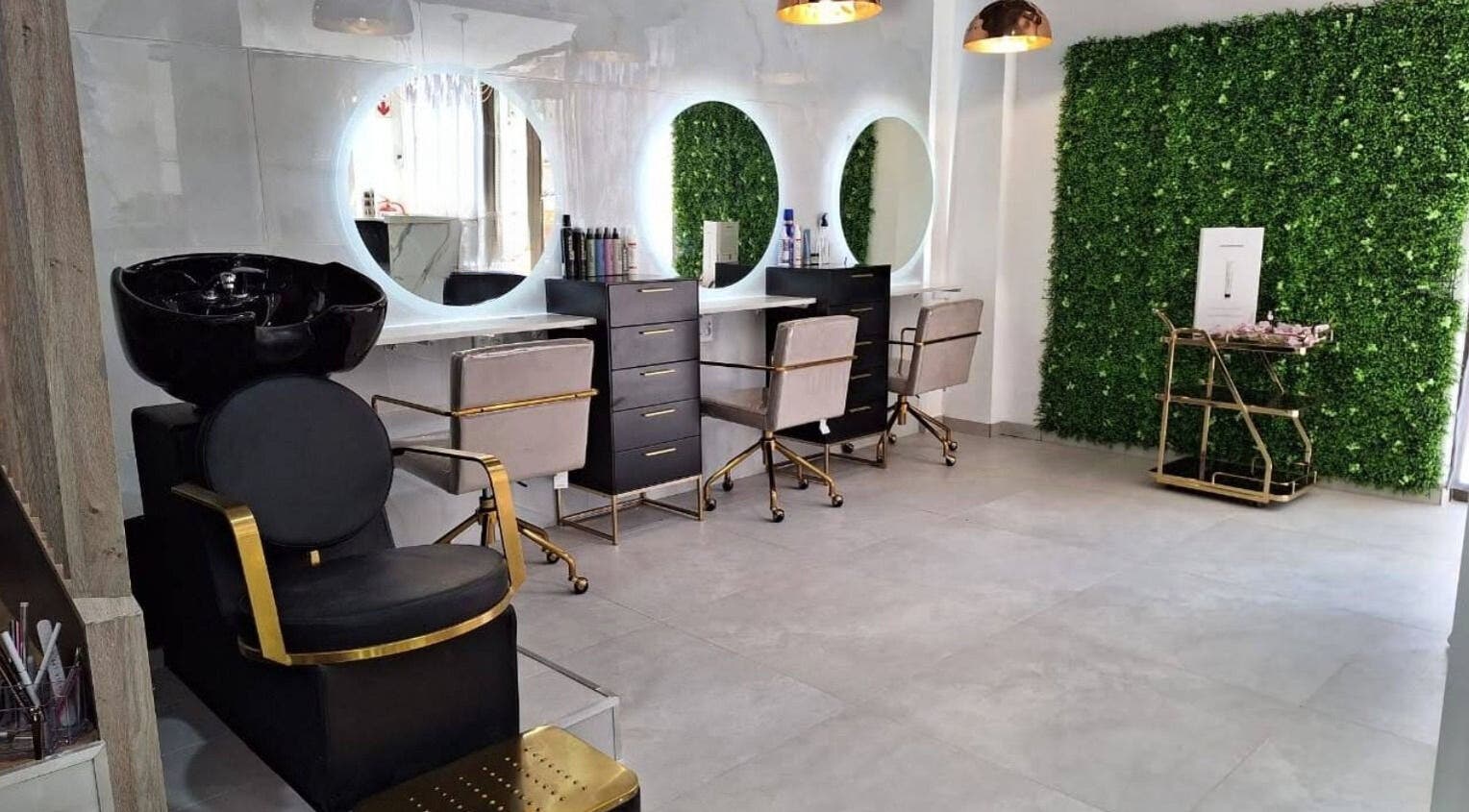 Stylish salon interior at The Glam Lounge, Berea, Kwazulu-natal, ZA with modern decor and sleek styling stations.