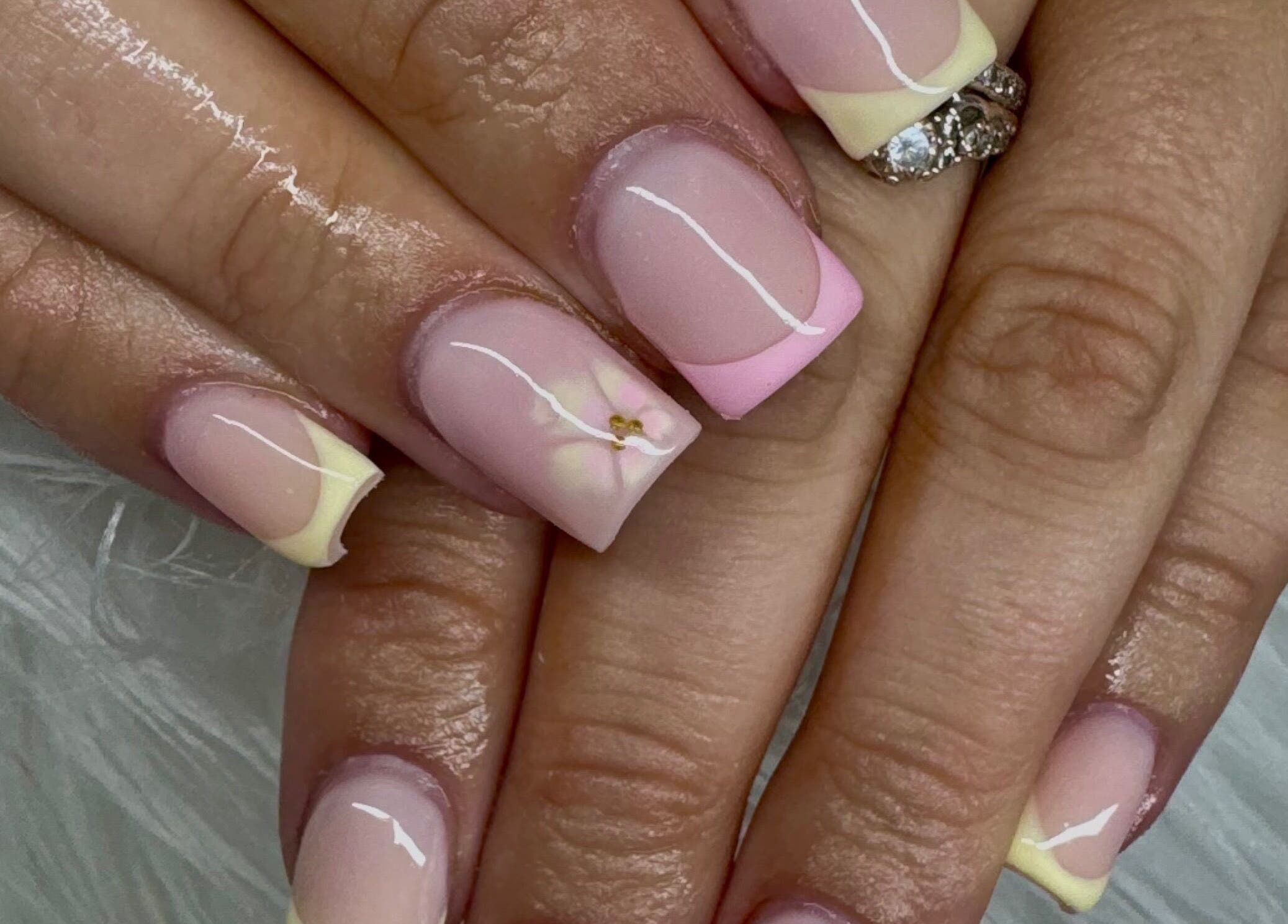 Chic pastel French manicure at Nailsbysoph Xox, located in Ruthin, Wales, GB.