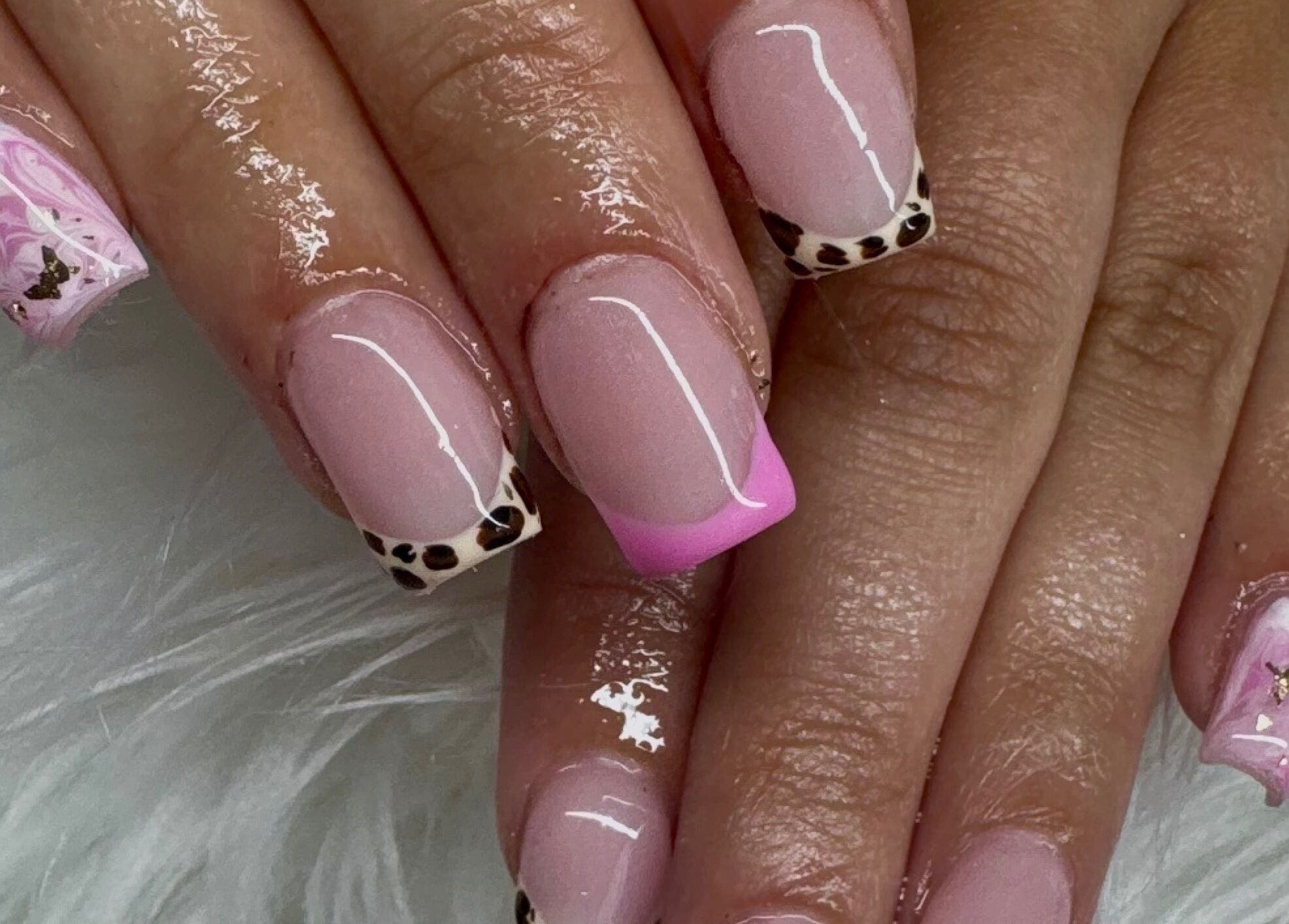 Elegant nail art with pink and leopard print by Nailsbysoph Xox in Ruthin, Wales, GB.