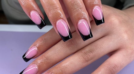 Elegant pink and black nail art at Nails by Ames, Pullman, Washington, US for a sophisticated look.