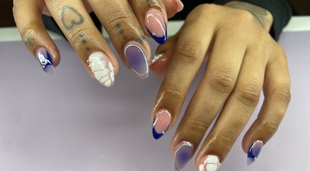 Elegant nail art with intricate designs at Nails by Ames, Pullman, Washington, US.