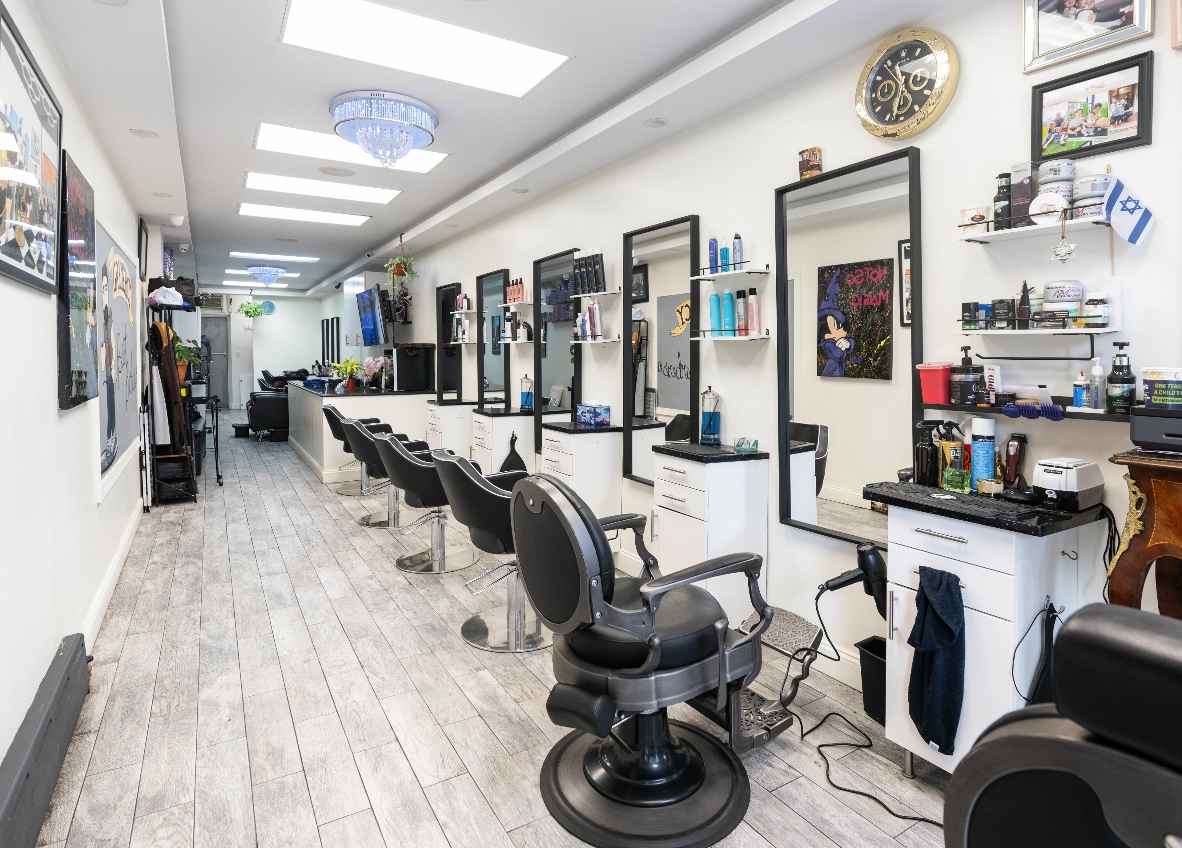 Modern interior of Balayage Studio in New York, New York, US, showcasing elegant styling stations.