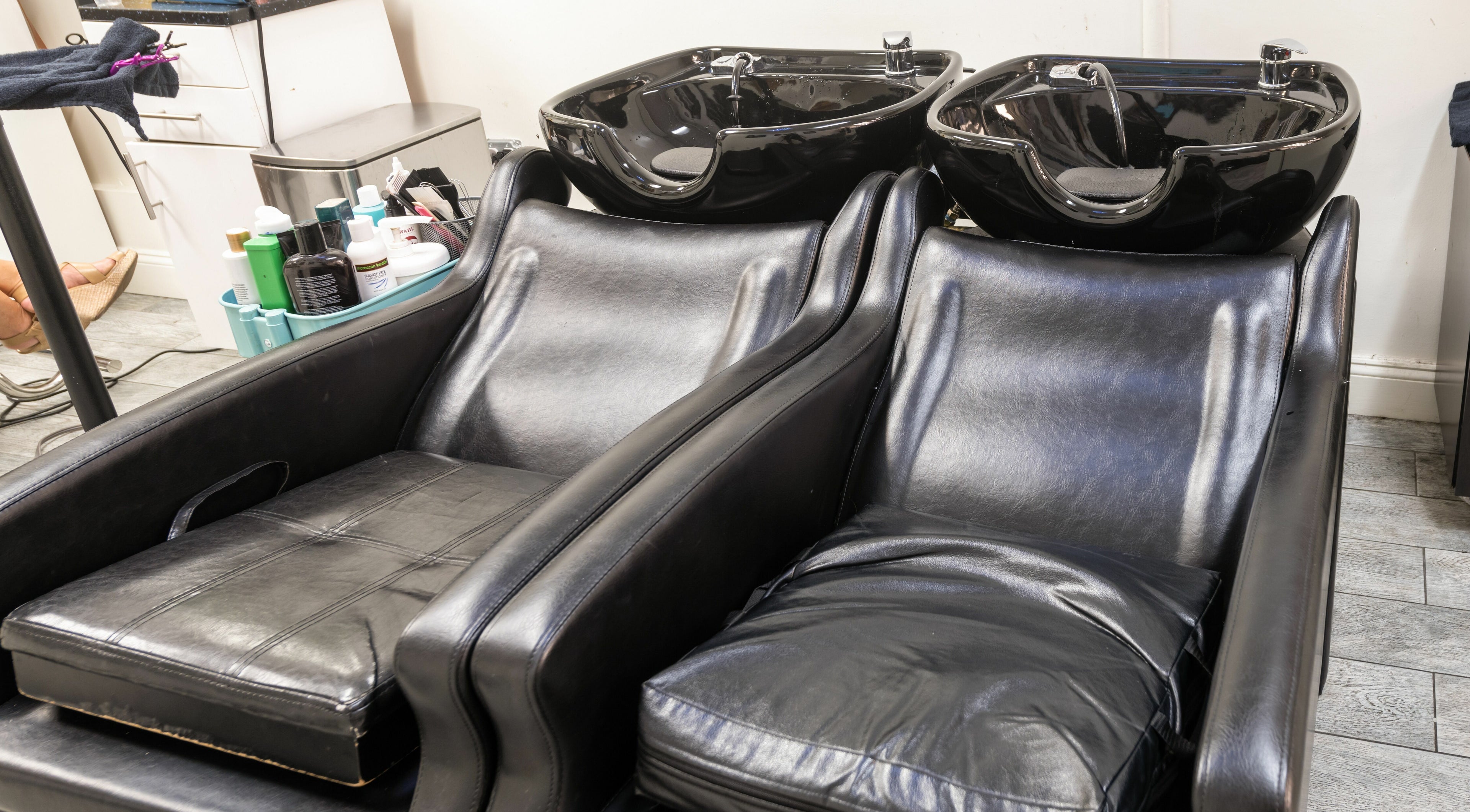 Stylish wash stations at Balayage Studio, New York, New York, US, showcasing comfort and luxury.