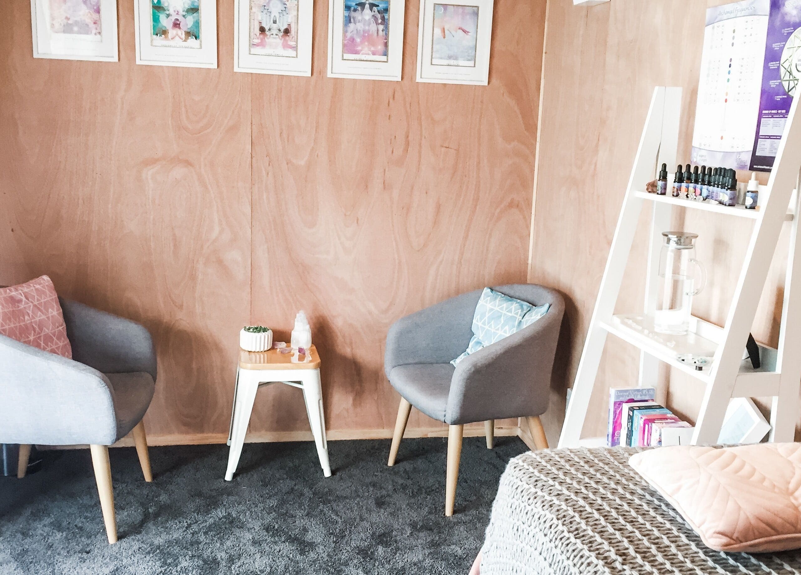 Tranquil consultation area at Kylie Paekau, Hamilton, Waikato, NZ, featuring chic decor and comfort.