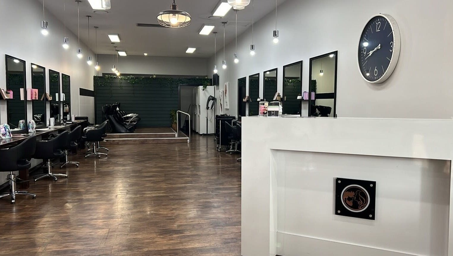 Modern interior of Argyle Hair Design, Picton, New South Wales, AU featuring sleek styling stations and decor.