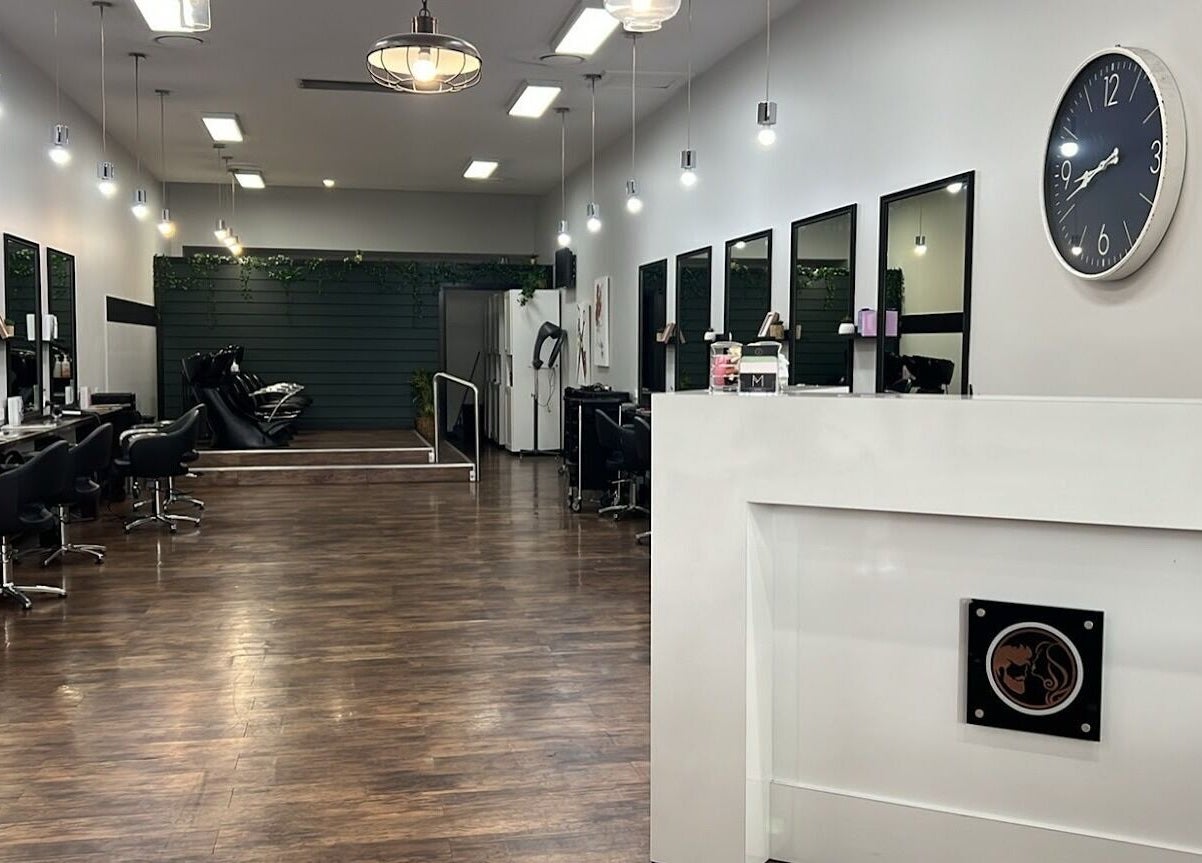 Modern interior of Argyle Hair Design, Picton, New South Wales, AU featuring sleek styling stations and decor.