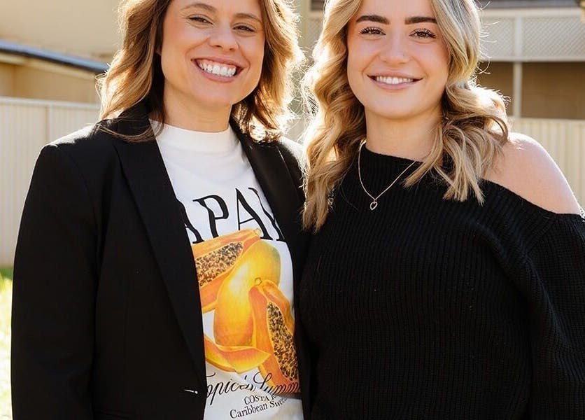 Two smiling women at Argyle Hair Design in Picton, New South Wales, AU, showcasing stylish fashion and hair.