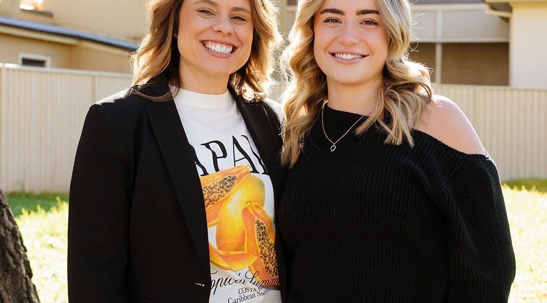 Two smiling women at Argyle Hair Design in Picton, New South Wales, AU, showcasing stylish fashion and hair.