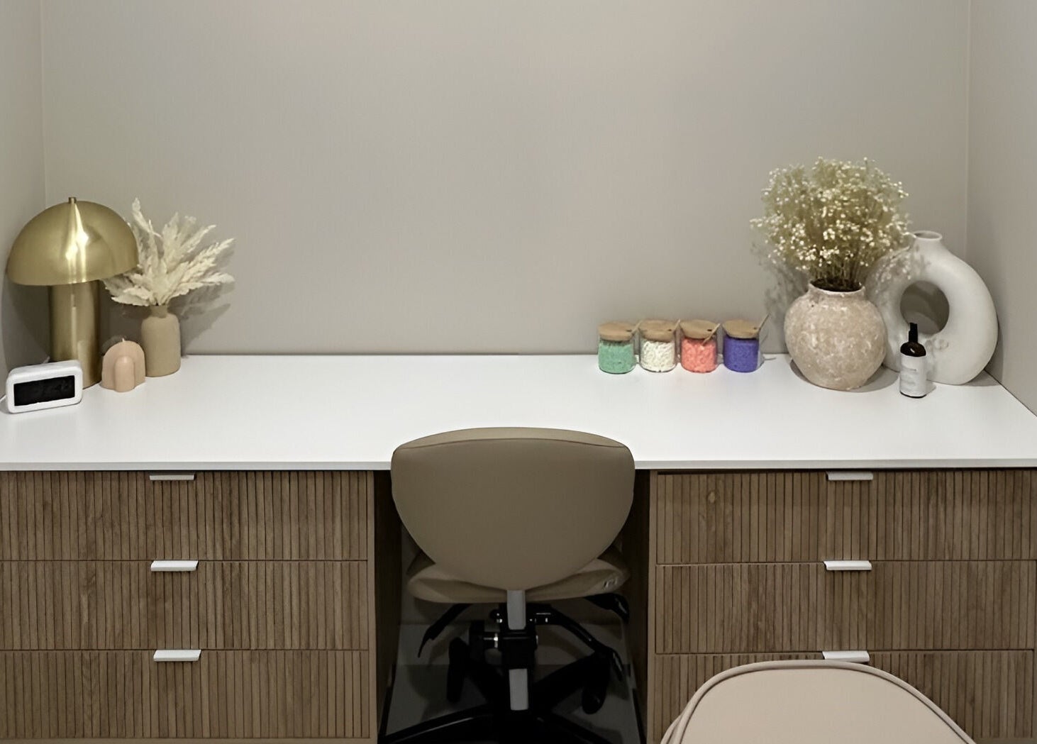 Minimalist workspace at Arch & Aura, Greystanes, New South Wales, AU with decor and organized desk items.