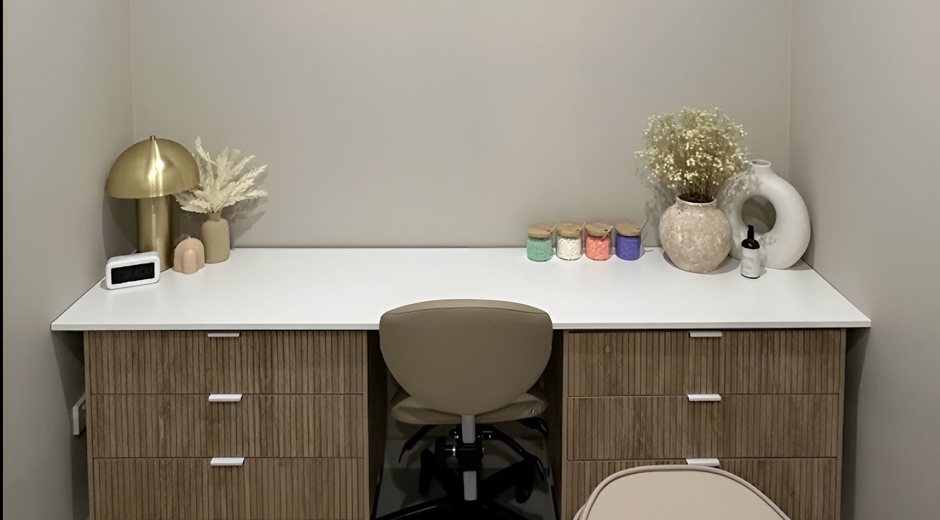 Minimalist workspace at Arch & Aura, Greystanes, New South Wales, AU with decor and organized desk items.