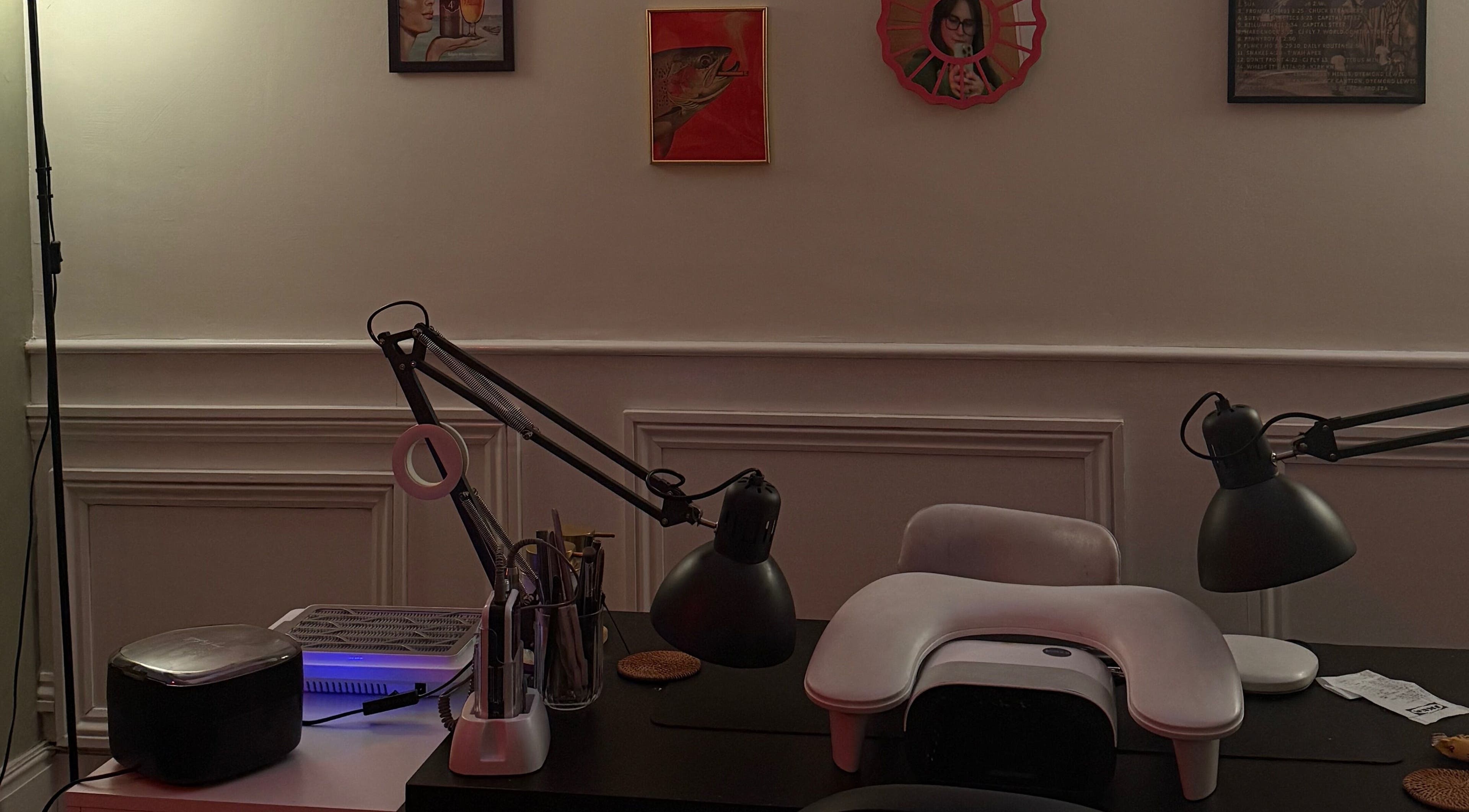 Modern nail care station at HT Collective, Dronfield, England. Elegant lighting enhances soothing ambiance.