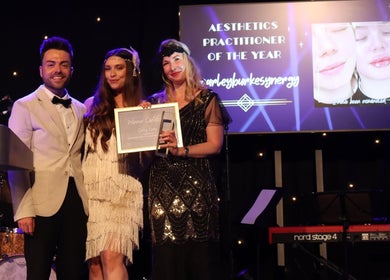 Award ceremony at Carley Burke Aesthetics, Bexley, England, GB showcasing aesthetics excellence.