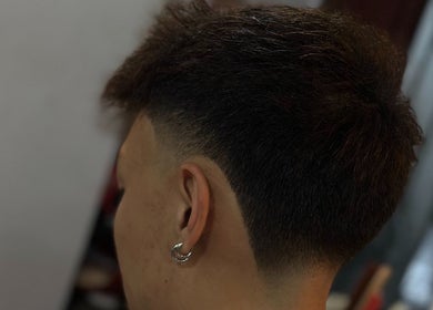 Close-up of a stylish fade haircut at Offcut Club, Singapore, Singapore, SG.